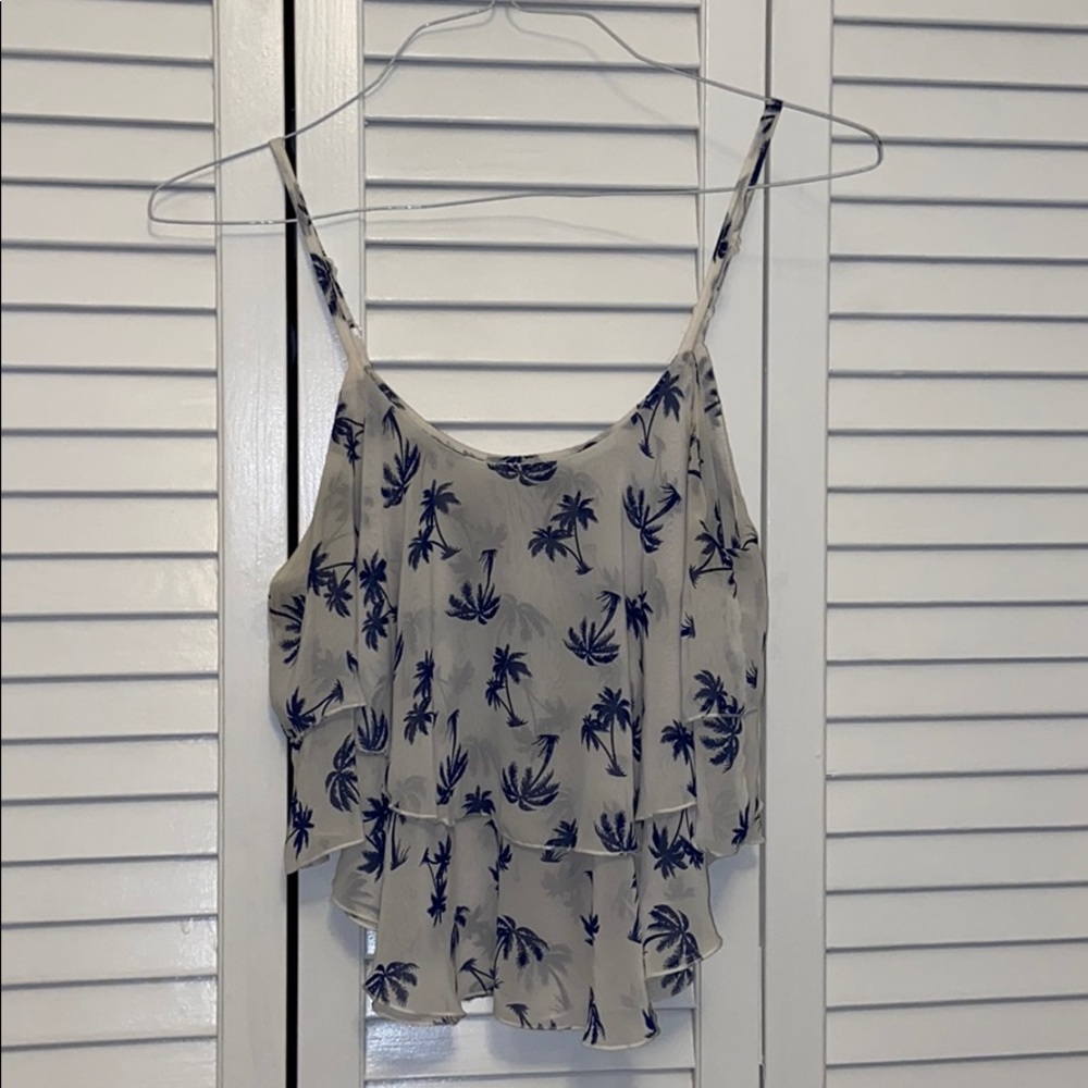Crop top with palm trees.